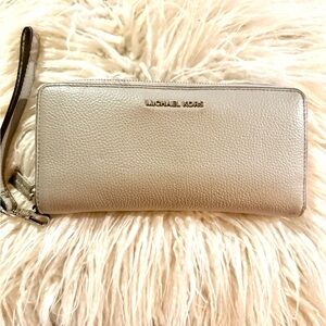Leather Michael Kors zipper wallet